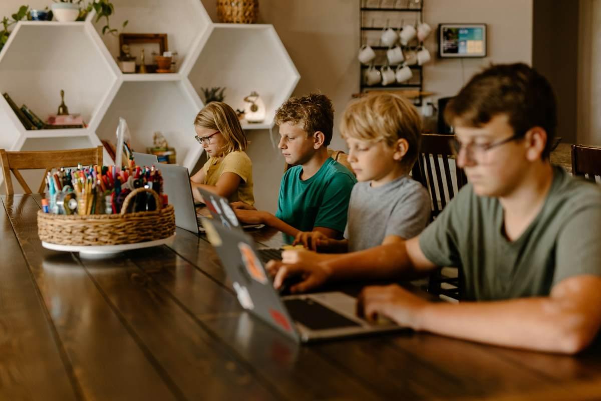 kids learning on laptops